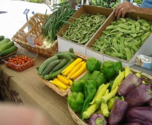 Summer travel scene: You will find local produce, baked goods, flowers, handmade items, and plenty of p