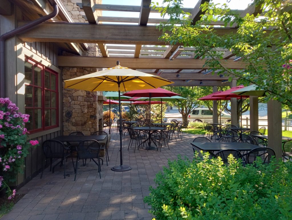 Summer travel scene: Stop for coffee, wander through local shops, and take your time walking around tow